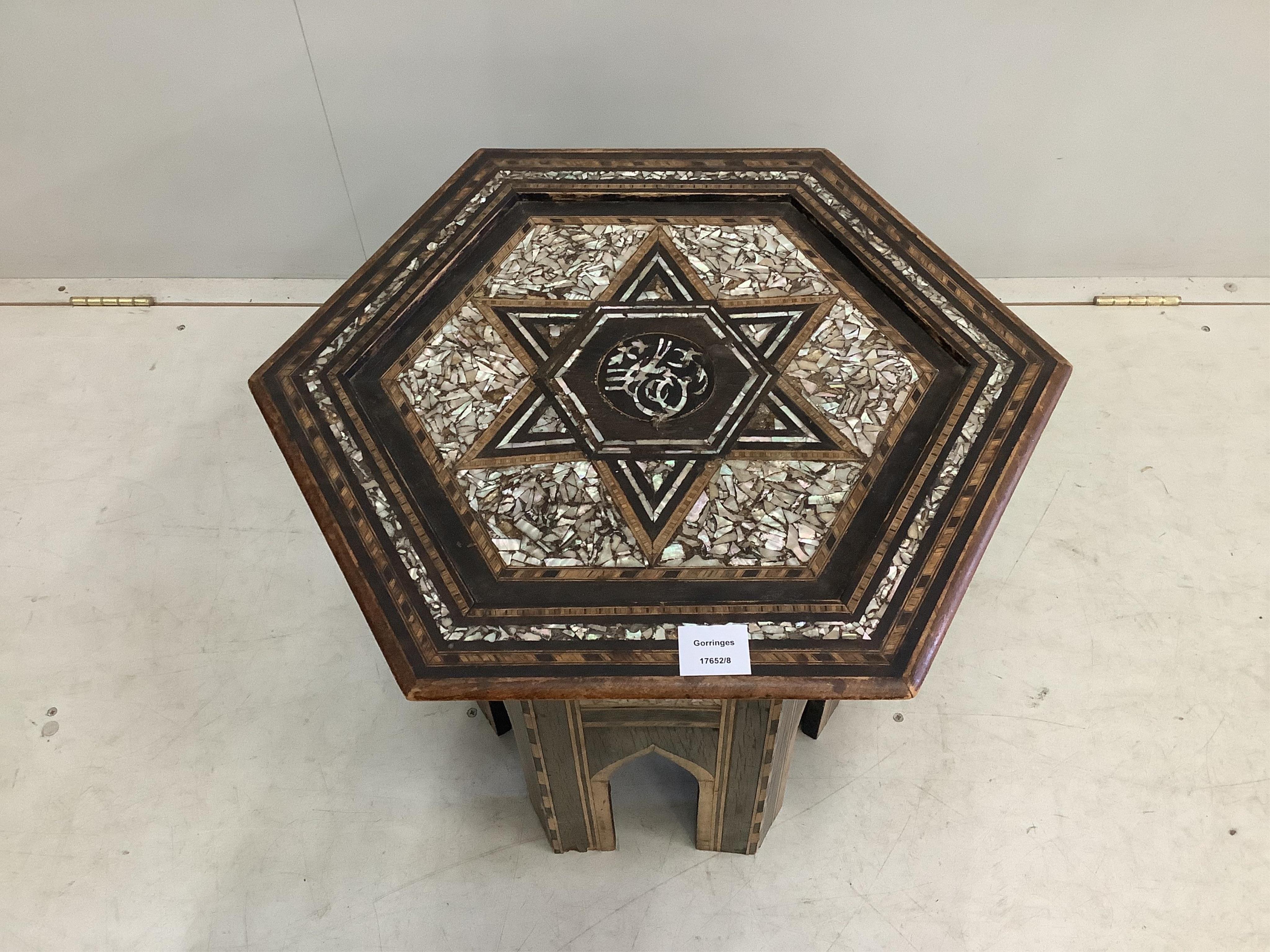 A Turkish Ottoman hexagonal mother of pearl inlaid table, width 49cm, height 51cm. Condition - fair